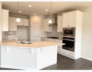 4710 Falls River Drive - Photo Thumbnail 3