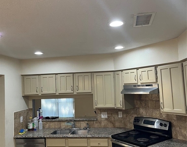 7010 Pickett Drive - Photo Thumbnail 7