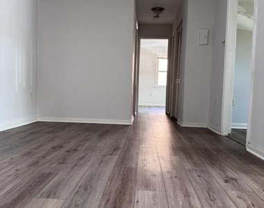5929 Quantrell Avenue - Photo Thumbnail 6