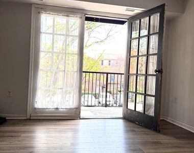 5929 Quantrell Avenue - Photo Thumbnail 4