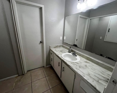 12118 W Bellfort Avenue - Photo Thumbnail 6