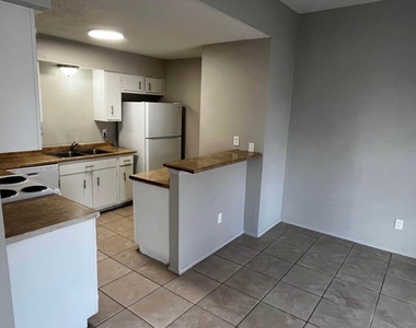 12118 W Bellfort Avenue - Photo Thumbnail 4