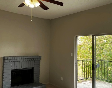 12118 W Bellfort Avenue - Photo Thumbnail 2