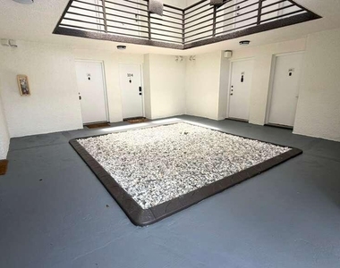 9711 Fontainebleau Boulevard - Photo Thumbnail 11