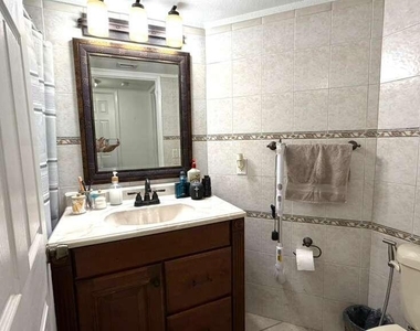 9711 Fontainebleau Boulevard - Photo Thumbnail 7