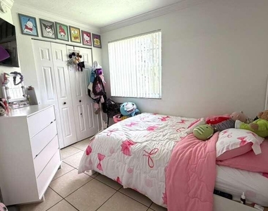 9711 Fontainebleau Boulevard - Photo Thumbnail 9