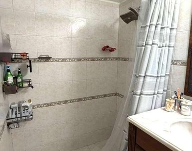 9711 Fontainebleau Boulevard - Photo Thumbnail 6