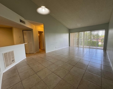 8891 Wiles Road - Photo Thumbnail 1