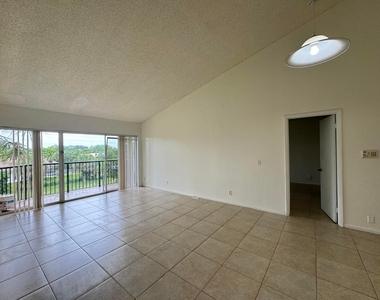 8891 Wiles Road - Photo Thumbnail 5