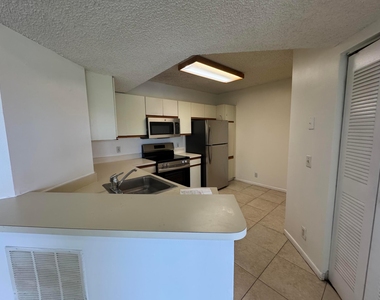 8891 Wiles Road - Photo Thumbnail 7