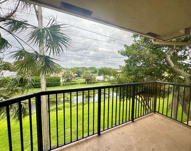8891 Wiles Road - Photo Thumbnail 9