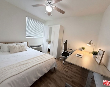 1254 W 37th Drive - Photo Thumbnail 3