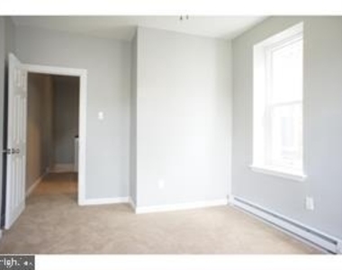 1644 N Dover Street - Photo Thumbnail 3