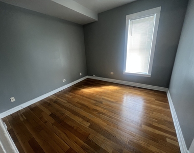 734 E 95th Street - Photo Thumbnail 3