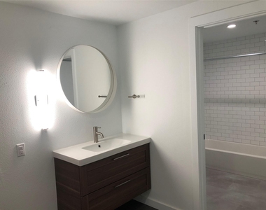 102 E 2nd St - Photo Thumbnail 7
