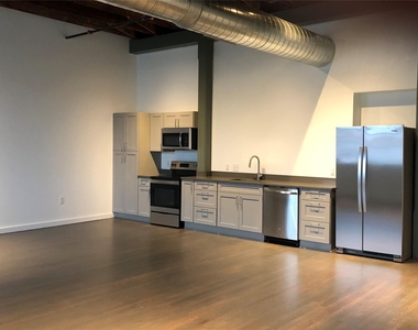 102 E 2nd St - Photo Thumbnail 3