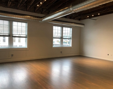 102 E 2nd St - Photo Thumbnail 2