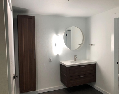 102 E 2nd St - Photo Thumbnail 8