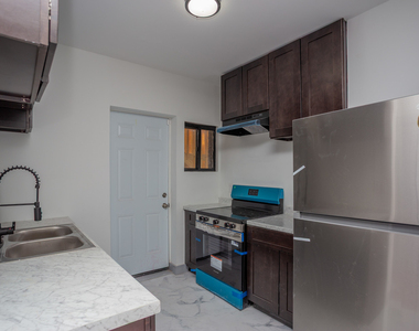 7505 S Yates Street - Photo Thumbnail 5