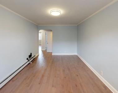 67-12 Juno Street - Photo Thumbnail 2