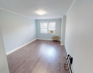 67-12 Juno Street - Photo Thumbnail 1