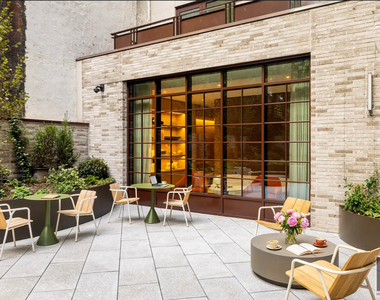 East 50 Street - Photo Thumbnail 9