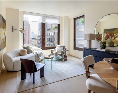 East 50 Street - Photo Thumbnail 1