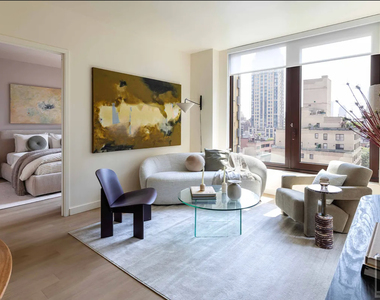 East 50 Street - Photo Thumbnail 3