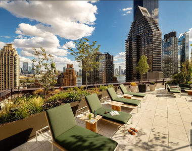 East 50 Street - Photo Thumbnail 15