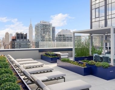 W 38th Street - Photo Thumbnail 8