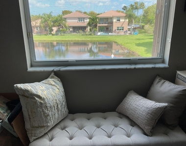 8219 Calabria Lakes Drive - Photo Thumbnail 59