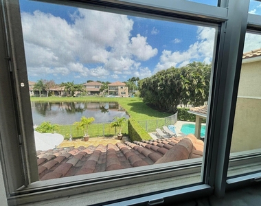 8219 Calabria Lakes Drive - Photo Thumbnail 72
