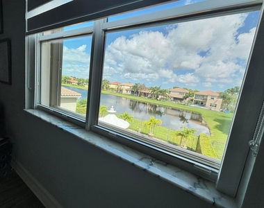 8219 Calabria Lakes Drive - Photo Thumbnail 79