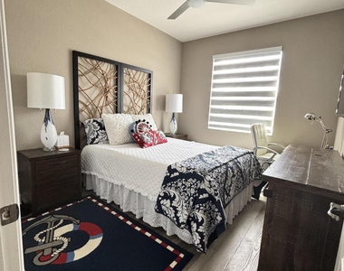 8219 Calabria Lakes Drive - Photo Thumbnail 74