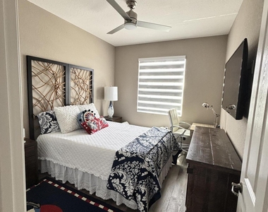 8219 Calabria Lakes Drive - Photo Thumbnail 75