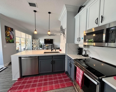 8219 Calabria Lakes Drive - Photo Thumbnail 33