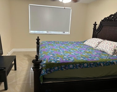 9033 Wiles Road - Photo Thumbnail 5