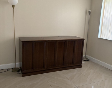 9033 Wiles Road - Photo Thumbnail 10