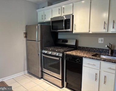 1300 S Arlington Ridge Road - Photo Thumbnail 8