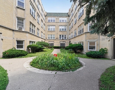 7019 S Merrill Avenue - Photo Thumbnail 1