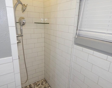 8821 Woodruff Street - Photo Thumbnail 18
