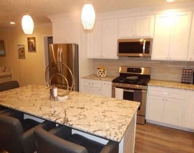 8821 Woodruff Street - Photo Thumbnail 2