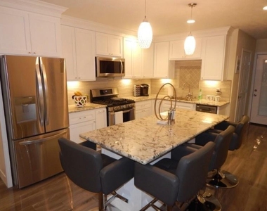 8821 Woodruff Street - Photo Thumbnail 4
