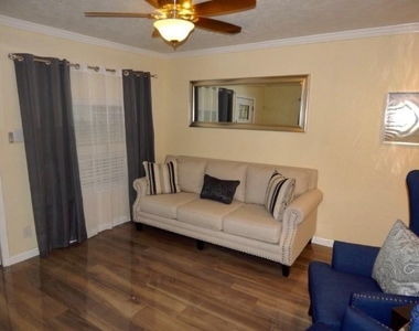 8821 Woodruff Street - Photo Thumbnail 1