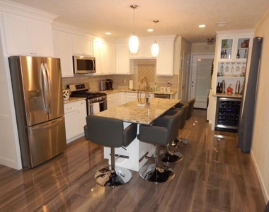 8821 Woodruff Street - Photo Thumbnail 3