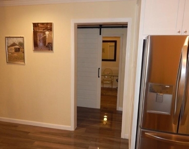 8821 Woodruff Street - Photo Thumbnail 7