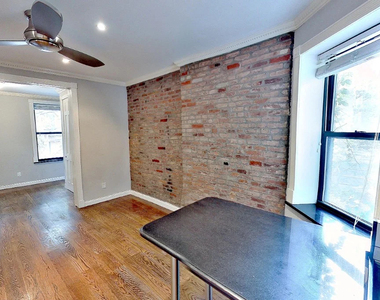 325 East 5th Street - Photo Thumbnail 4