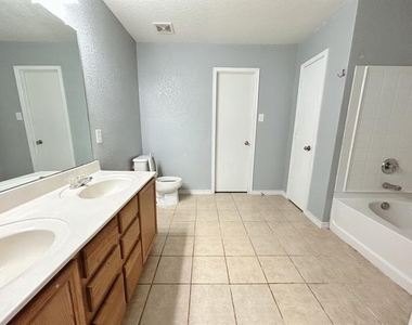 8008 Hidden Oaks Drive - Photo Thumbnail 8