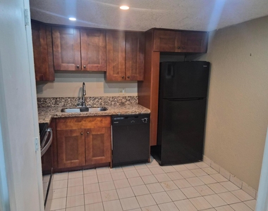 4166 Inverrary Drive - Photo Thumbnail 9
