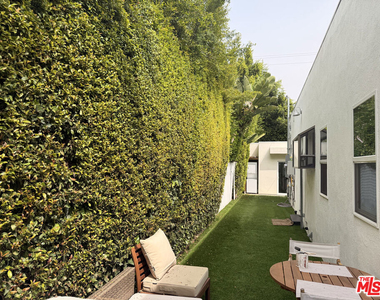 1162 N Poinsettia Place - Photo Thumbnail 1